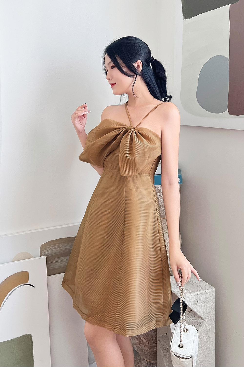 Đầm hai dây dự tiệc phối nơ dáng xòe