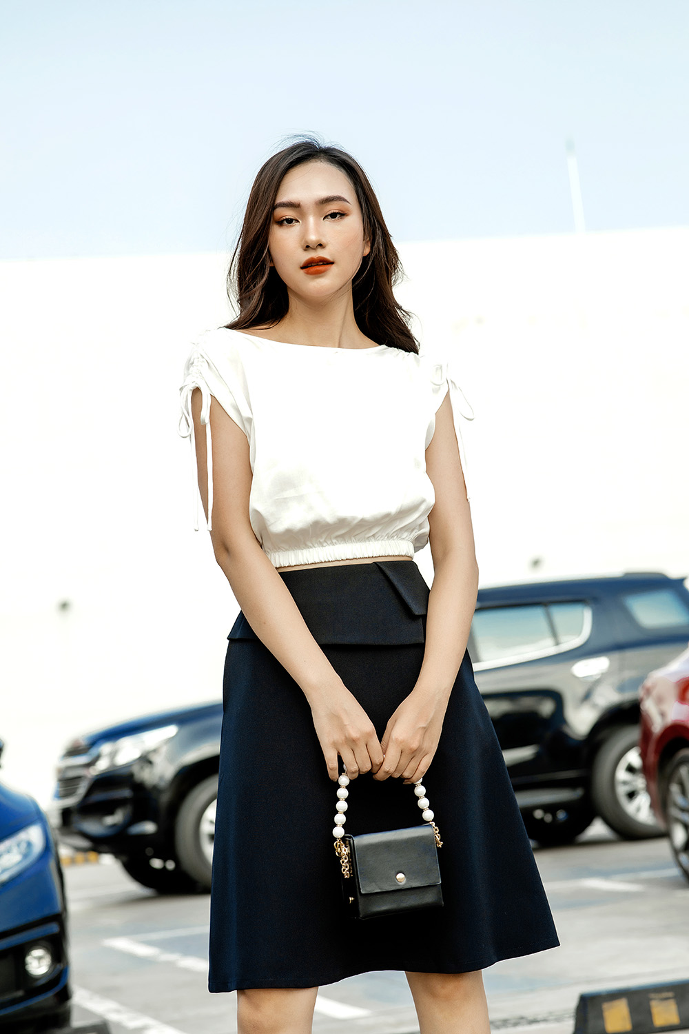 Chân váy đen dáng chữ A có túi 